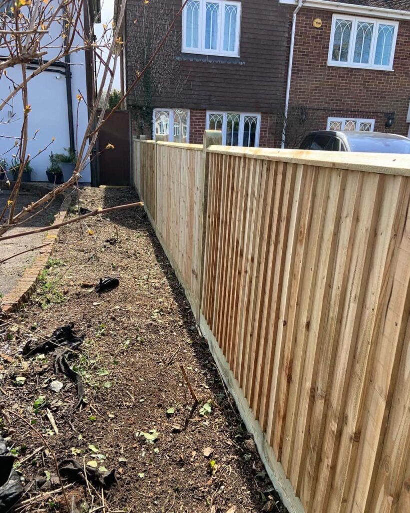 This is a photo of feather edge fencing installed in a residential property by Fast Fix Fencing Kings Lynn